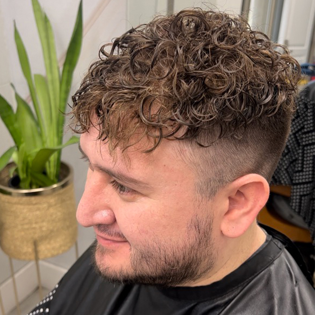 Finished curly men's hair system result with Monk the Guru